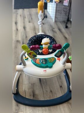 Fisher-Price Baby Bouncer Spacesaver Jumperoo Activity Center with Lights Sounds